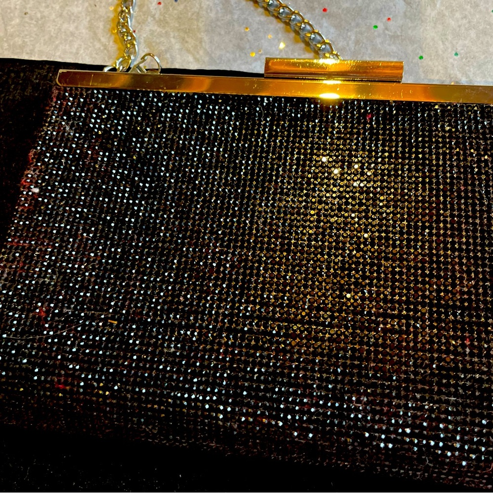 #Nina night club purse. Silver trim and Sparkling black design!